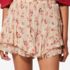 Fladende shorts i printet musselin