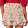 Fladende shorts i printet musselin