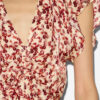Lonea flydende mønstret jacquard-top