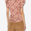 Lonea flydende mønstret jacquard-top
